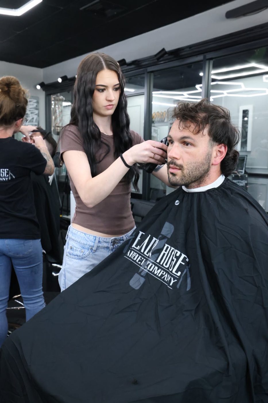 Karissa cutting in the barbershop