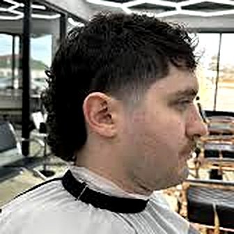 Curly mullet with a taper