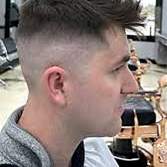 Textured quiff with a high skin fade