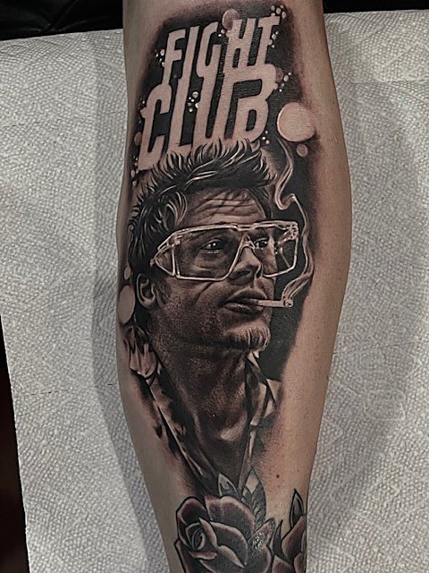 Portrait in glasses above a rose, calf