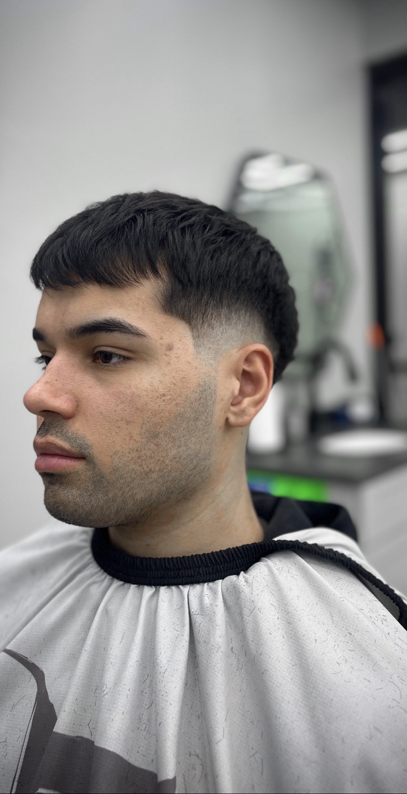 Textured crop with a clean mid fade