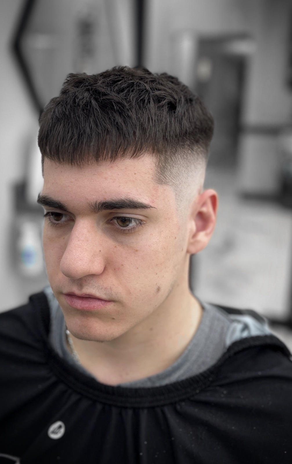 French crop with a high skin fade