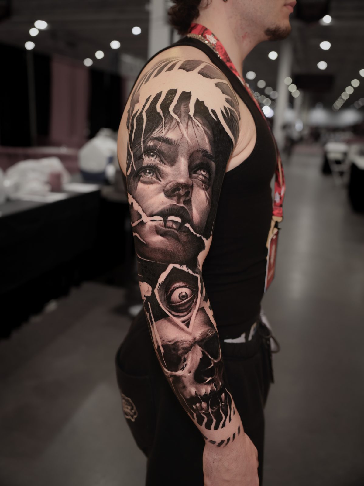 Portrait at the shoulder over a skull, full sleeve