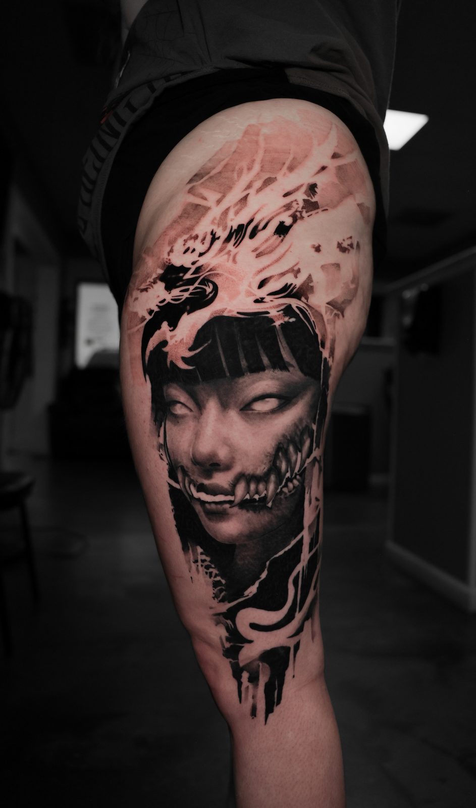 Portrait with a fanged jaw, thigh piece