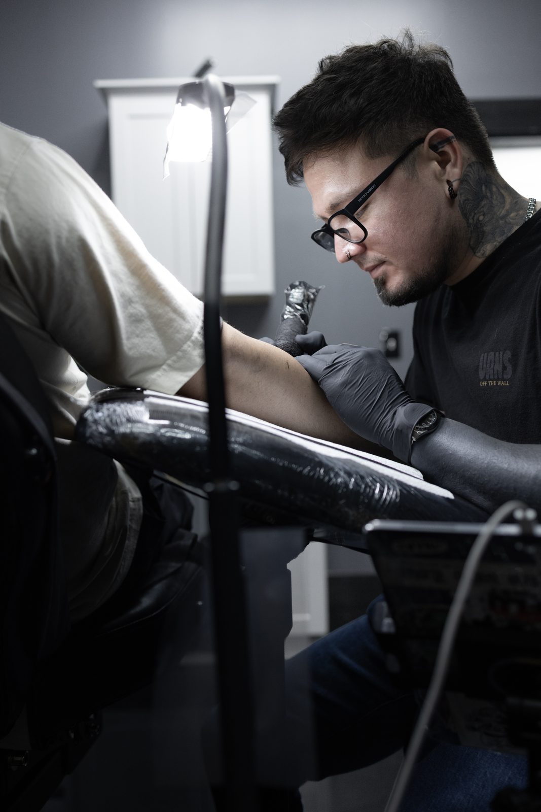 Juan at work on a sleeve