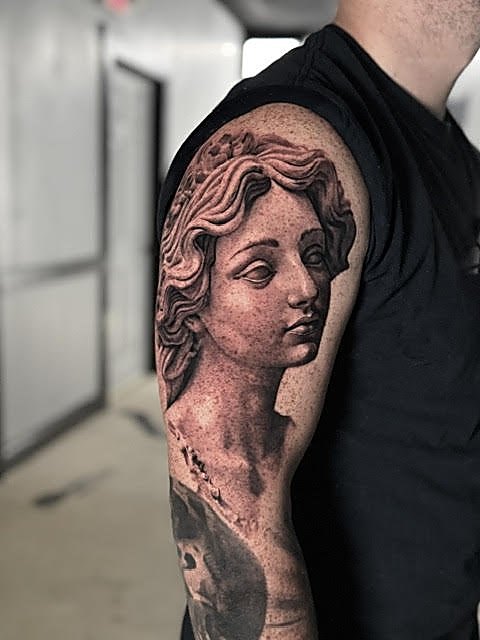 Classical statue bust across the shoulder