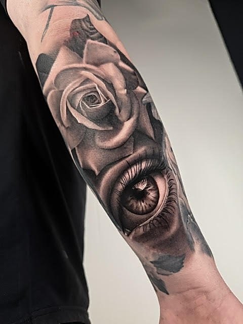 Rose and eye on the forearm