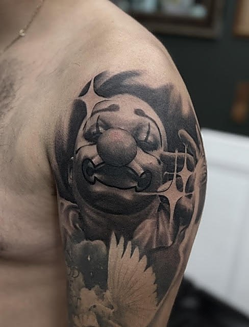 Skull and blossom across the shoulder