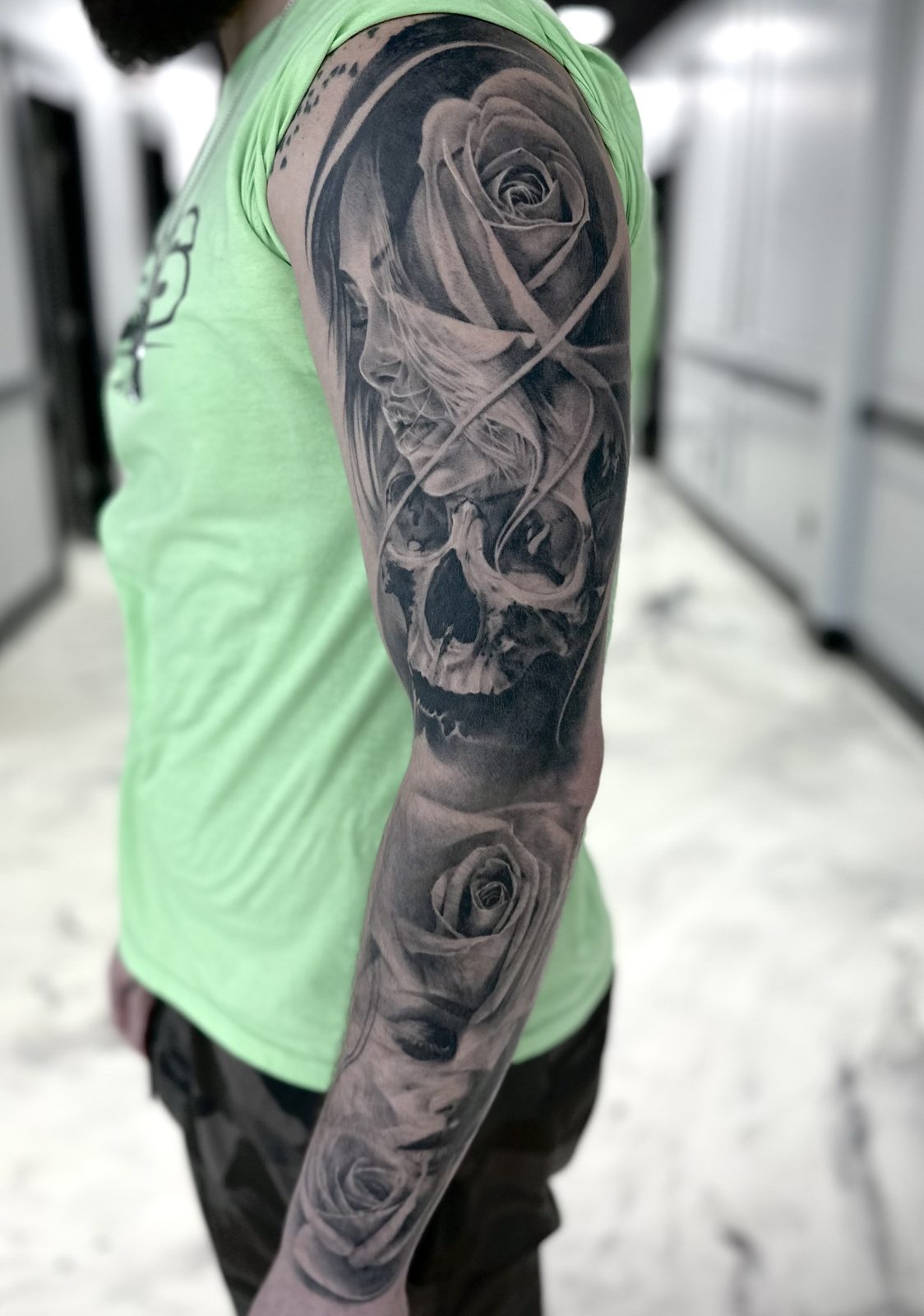 Skull and roses through a full sleeve