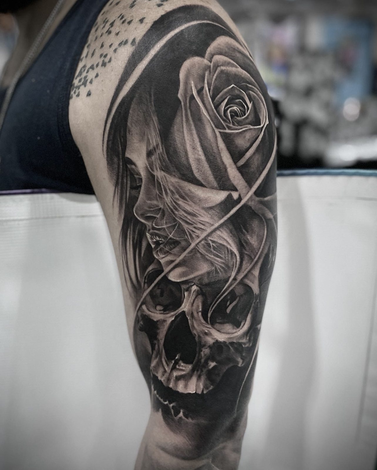 Rose and skull, shoulder and upper arm