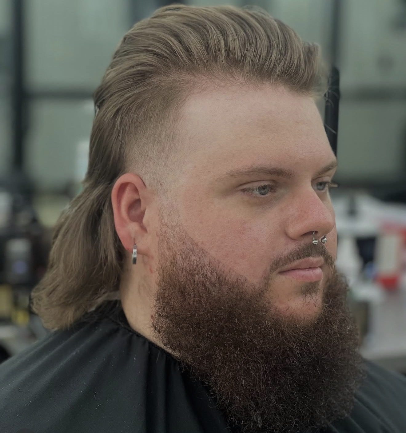 Mullet with a full beard, side view