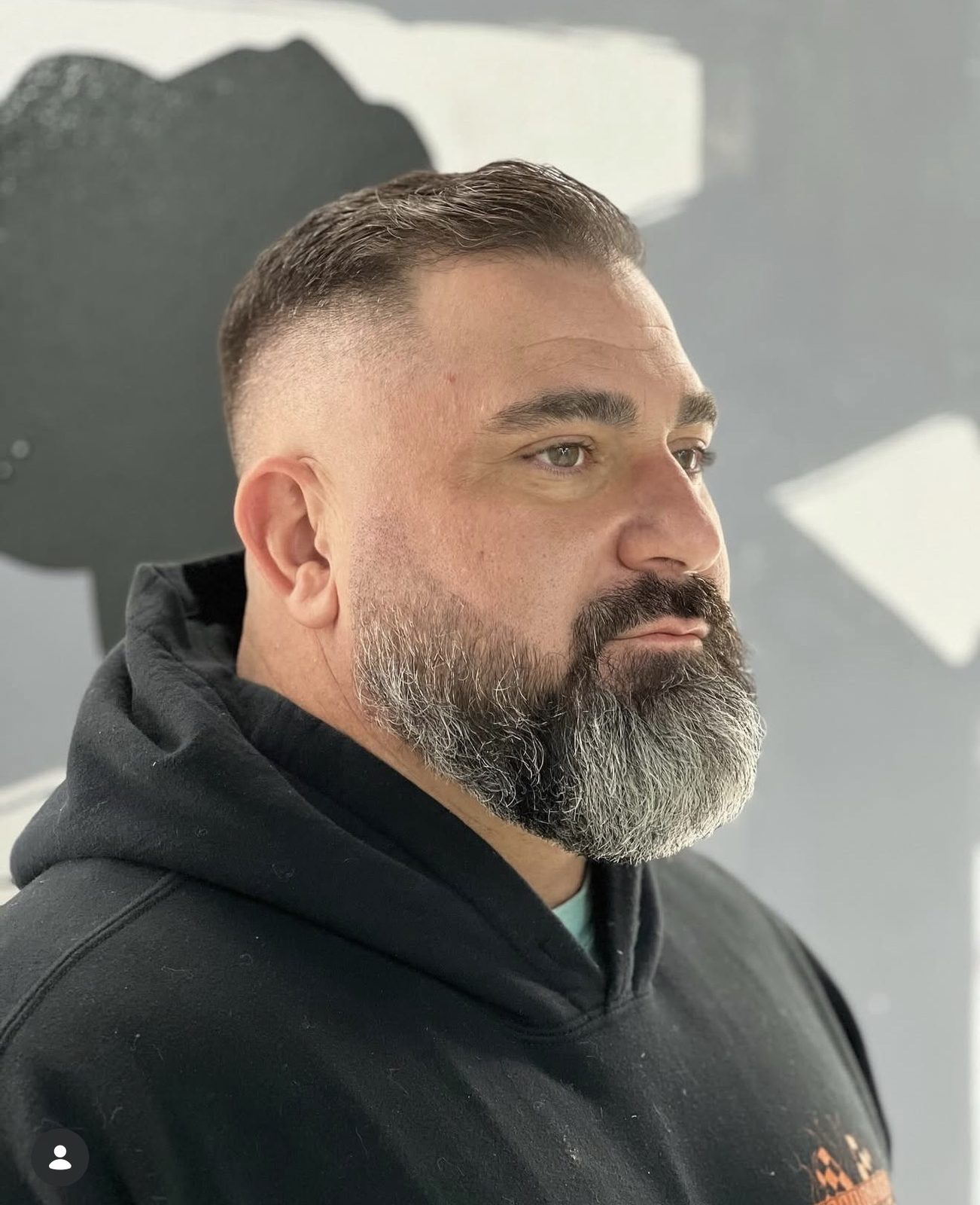 Grey beard with a clean fade