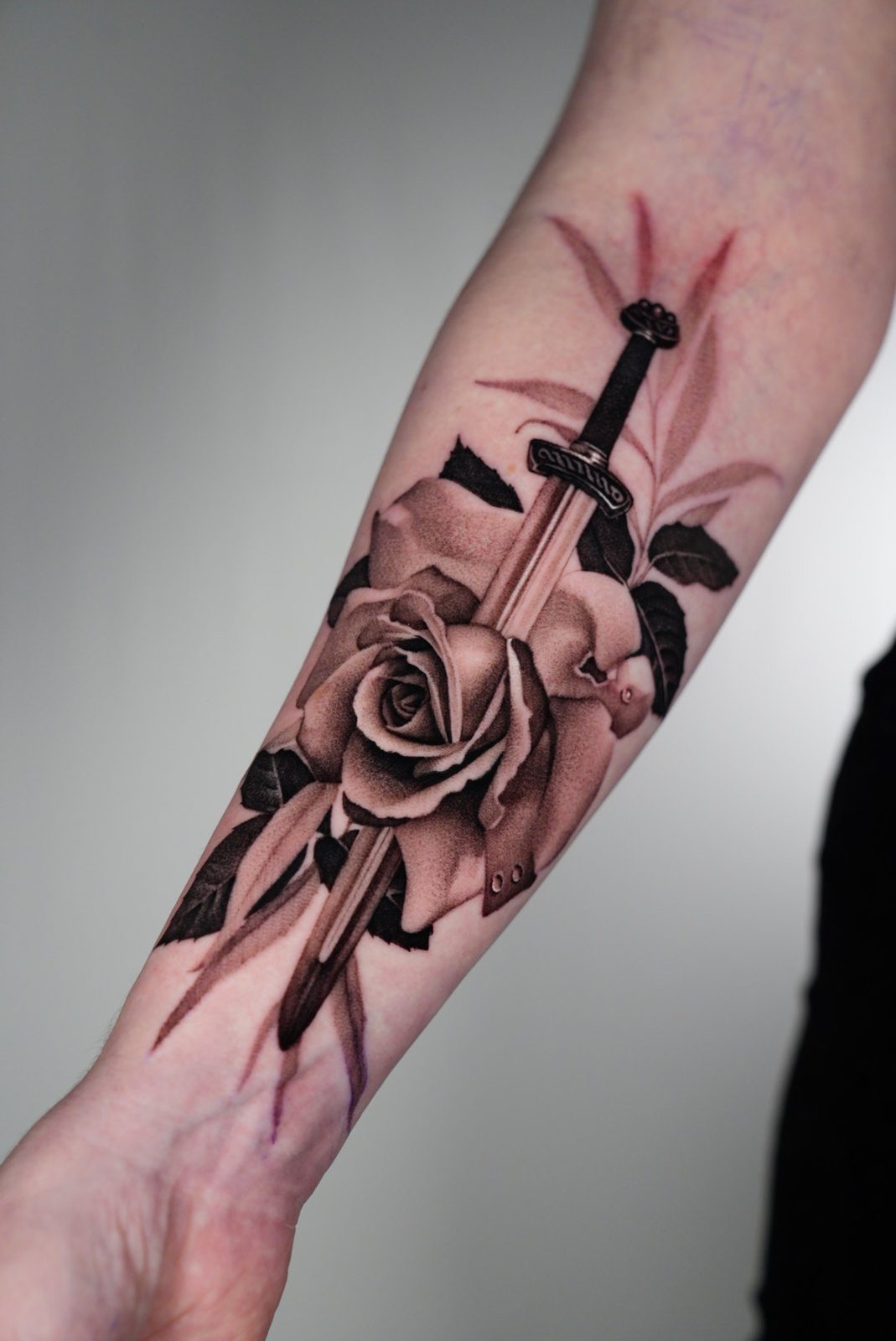 Dagger through a rose, black and grey